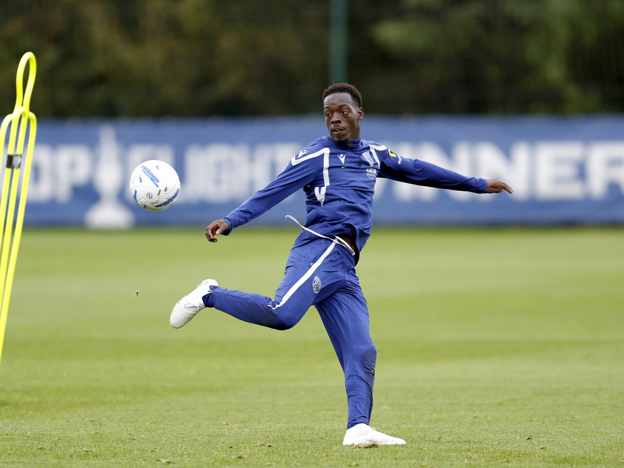 Rabby Nzingoula preparing to take a shot during training 