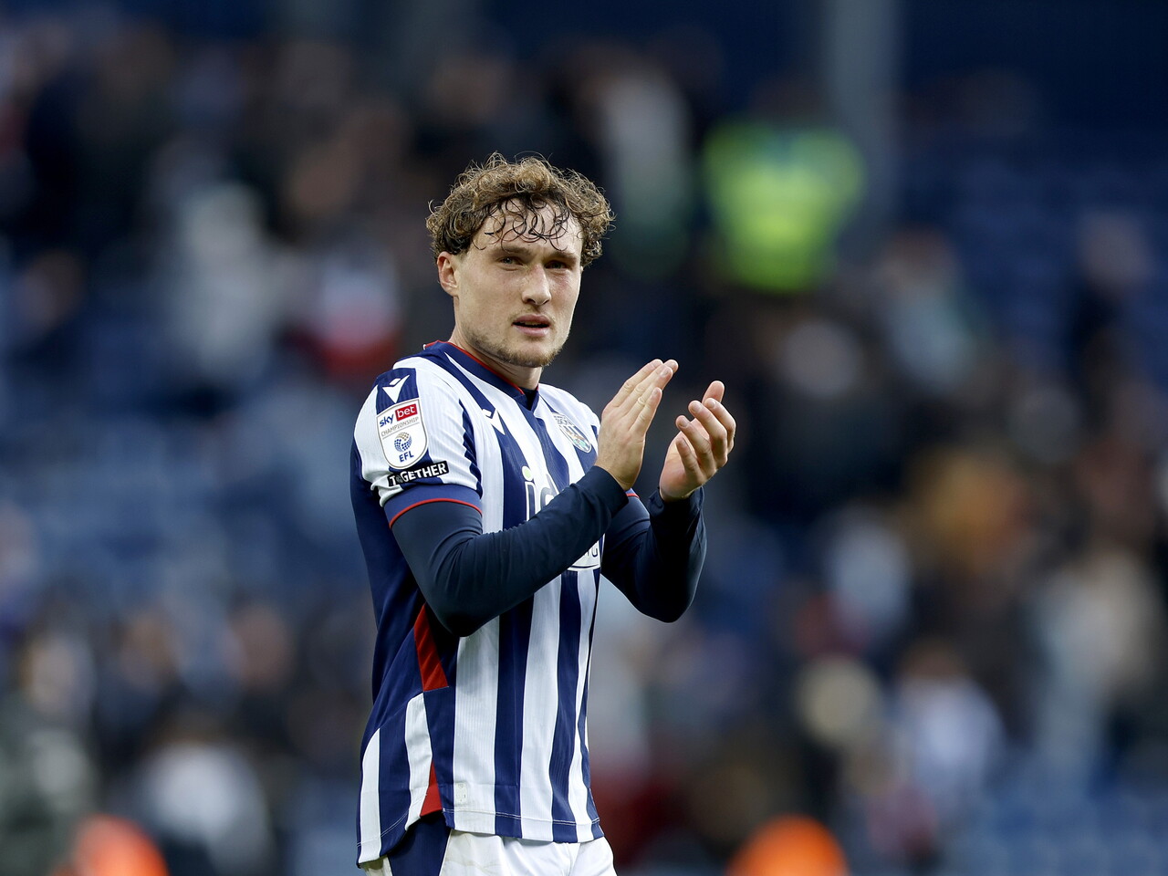 Callum Styles applauds the fans at full-time