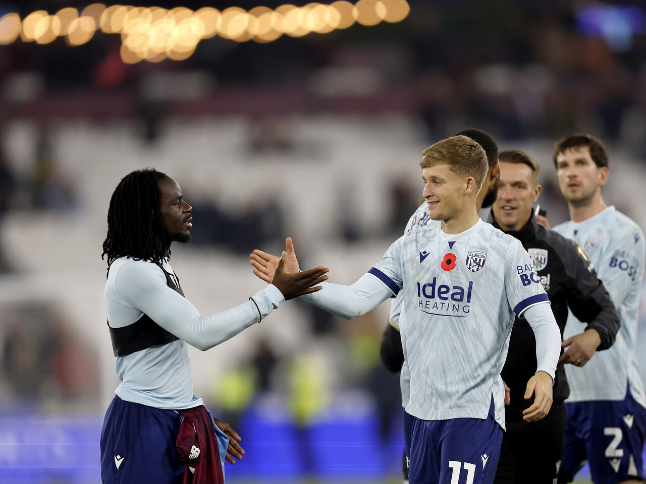 JJ Morgan and Brayann Pereira celebrate at full-time