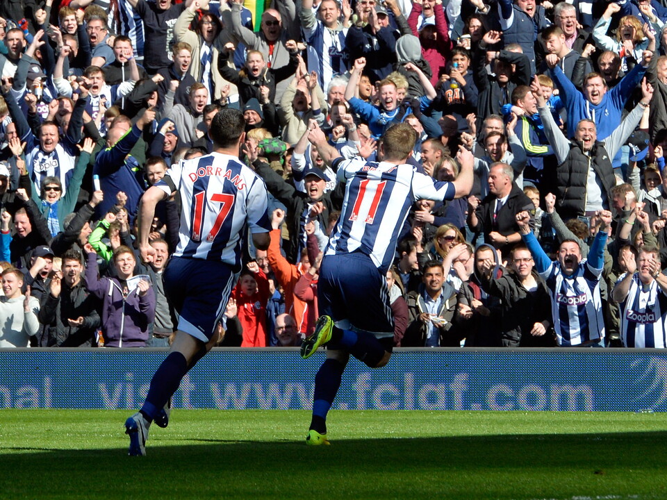 Chris Brunt celebrates
