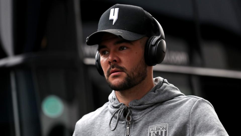 Alex Mowatt arriving at stadium