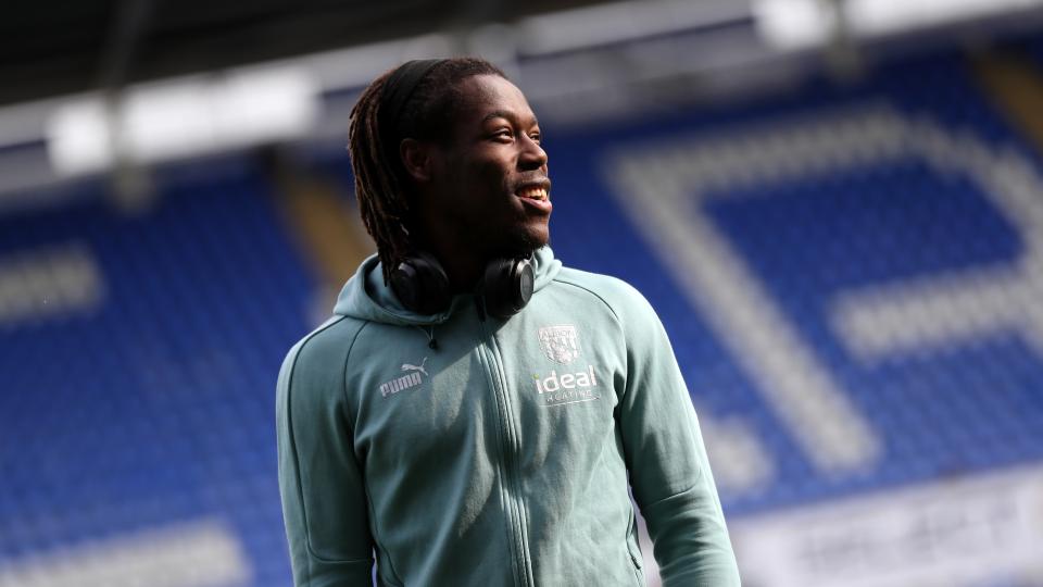 An image of Brandon Thomas-Asante smiling ahead of Albion's match at Reading