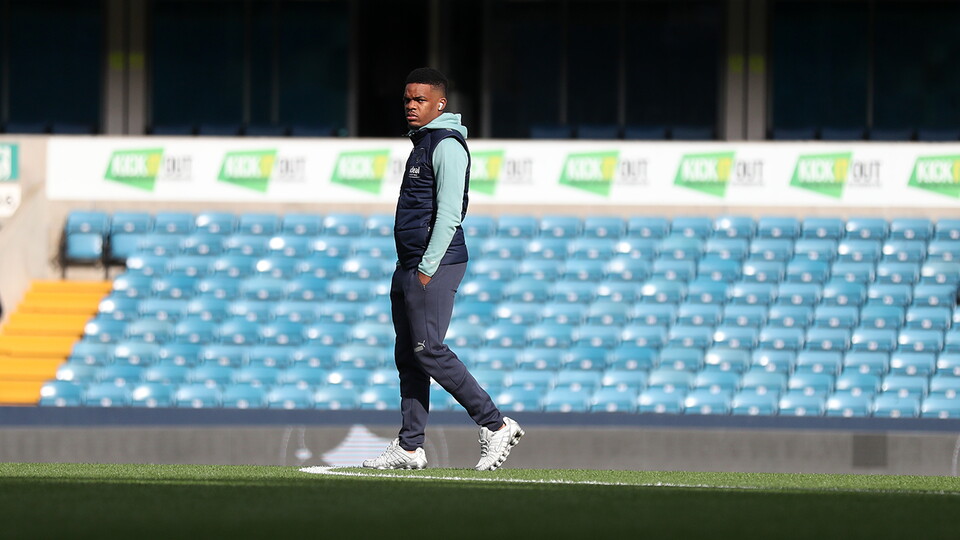 Grady Diangana inspects the pitch at the Den