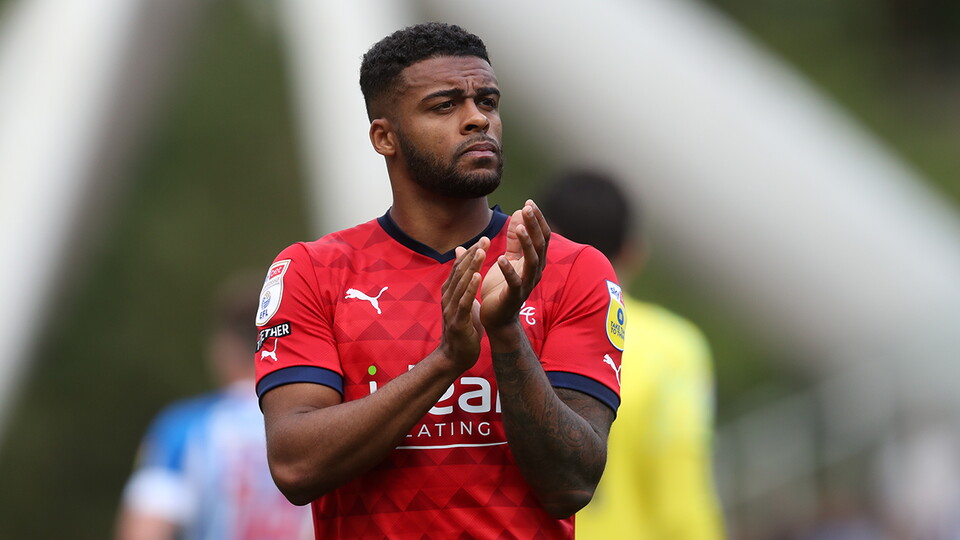 Darnell Furlong applauds the fans post Huddersfield Town
