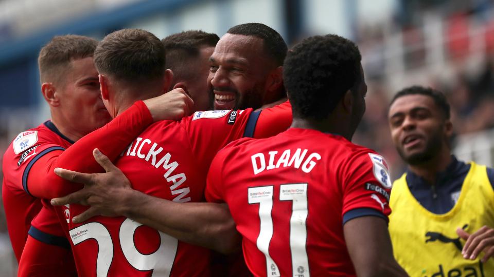 An image of Matty Phillips celebrating his goal against Reading with his Albion teammates