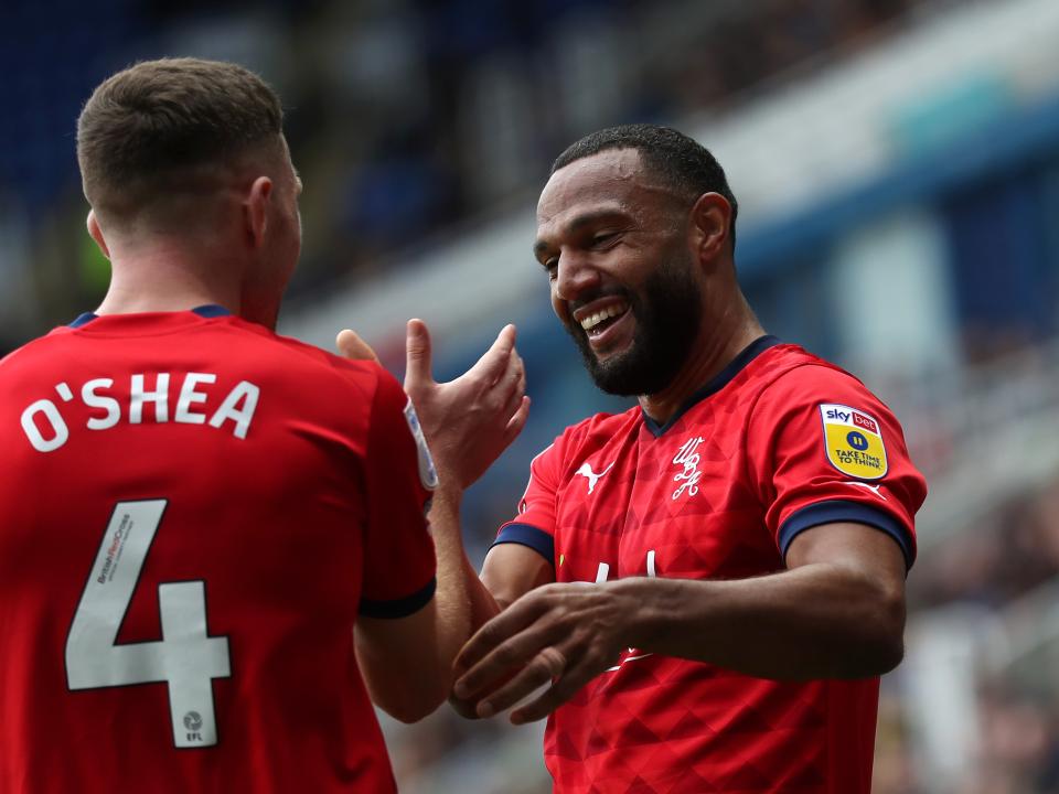 An image of Matty Phillips celebrating with Dara O'Shea after a goal at Reading
