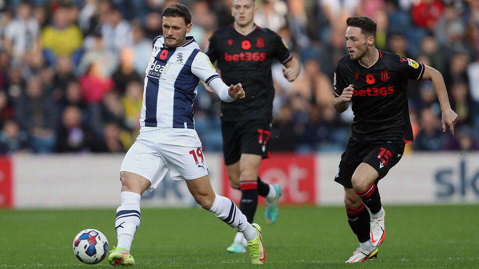 John Swift on the ball in Albion's game against Stoke City