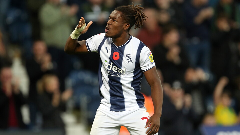 Brandon Thomas-Asante celebrates scoring Albion's second goal against Stoke City