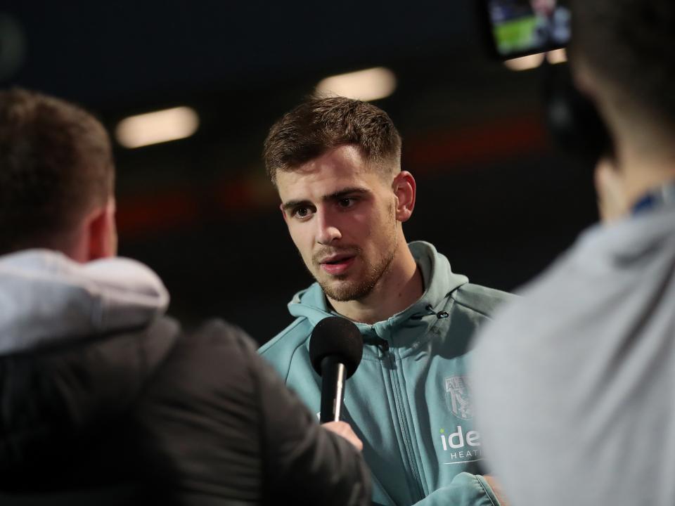 Jayson Molumby is interviewed following Albion's win at Loftus Road