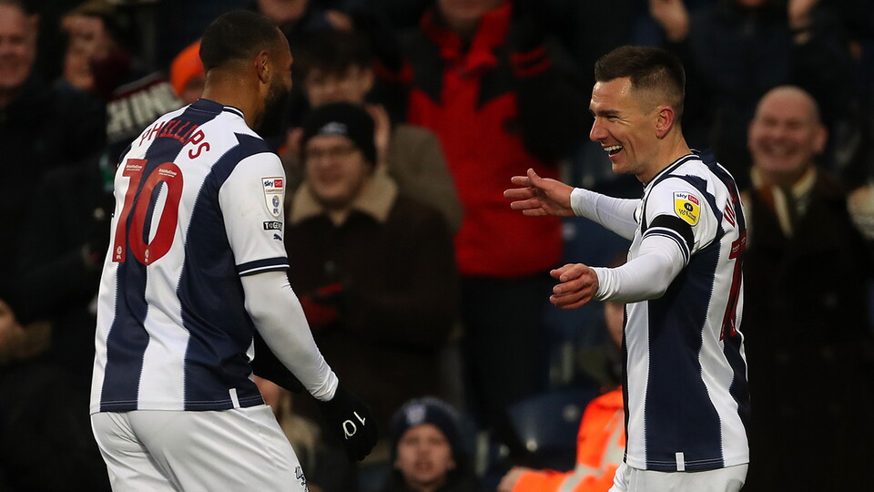 Jed Wallace and Matt Phillips celebrate after the opening goal against Rotherham