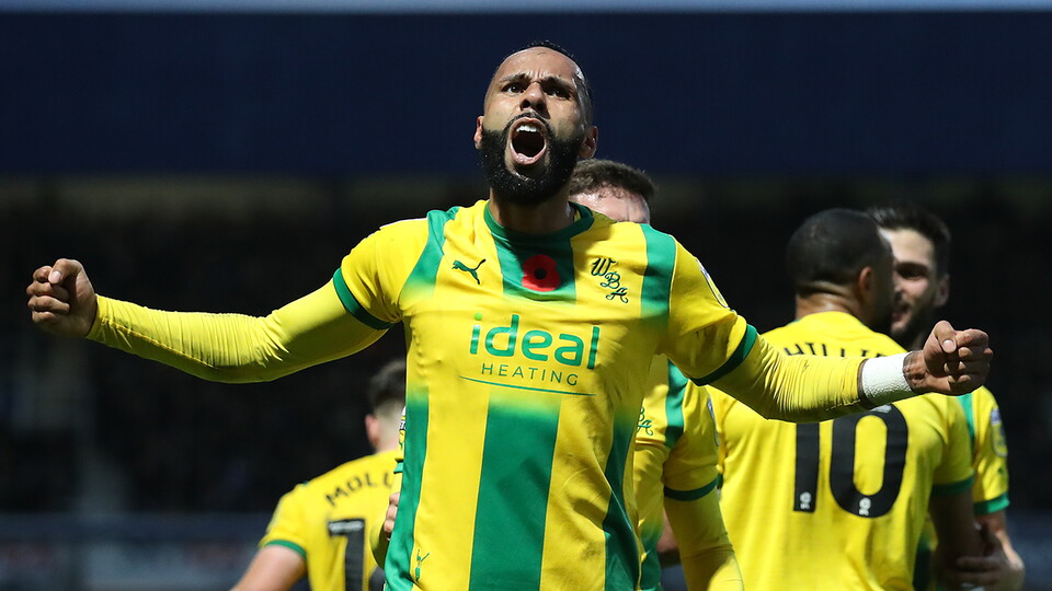 Kyle Bartley celebrates Albion's winning goal at QPR