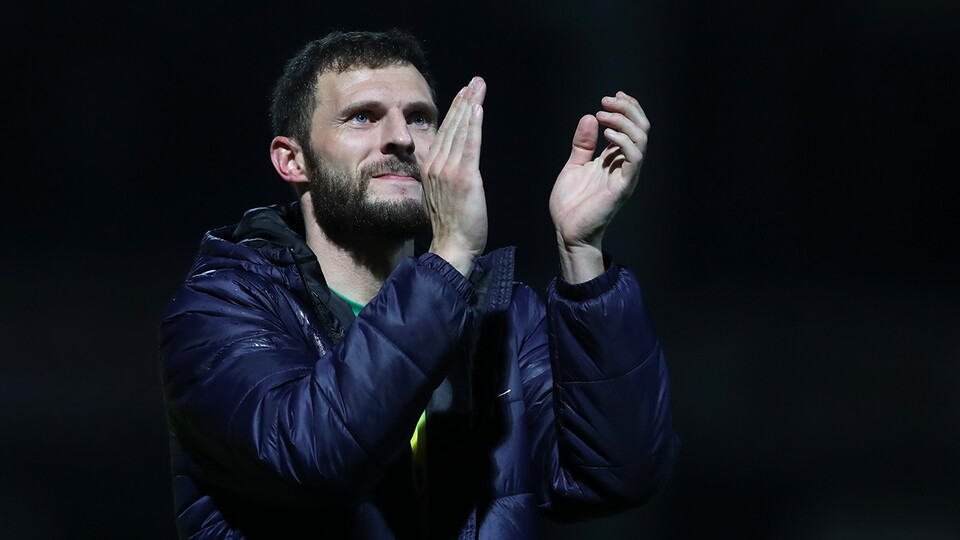 Erik Pieters applauds the away supporters after Albion's win against QPR