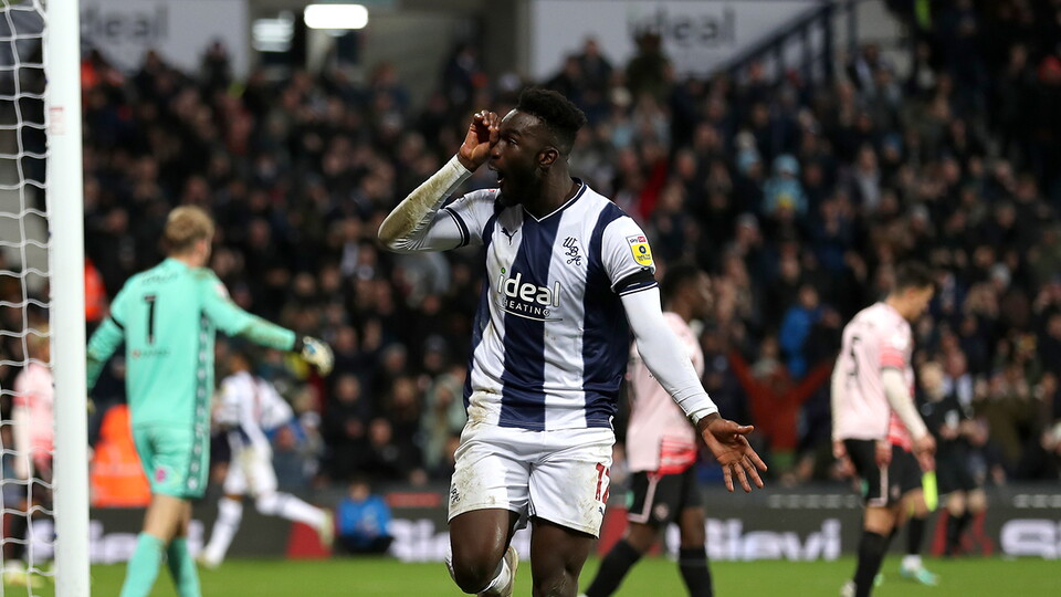 Daryl Dike celebrates making it 1-0 for Albion v Reading