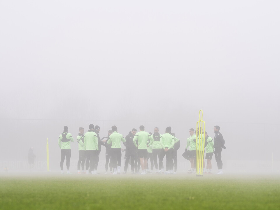 Albion players in a huddle on the training pitch