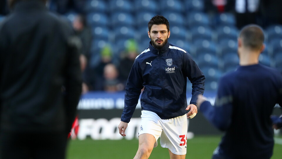 Okay Yokuslu warming up ahead of Albion v Reading