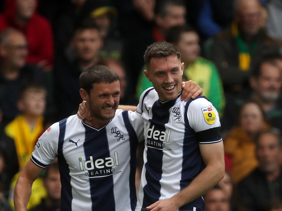 John Swift and Dara O'Shea celebrate a Baggies goal