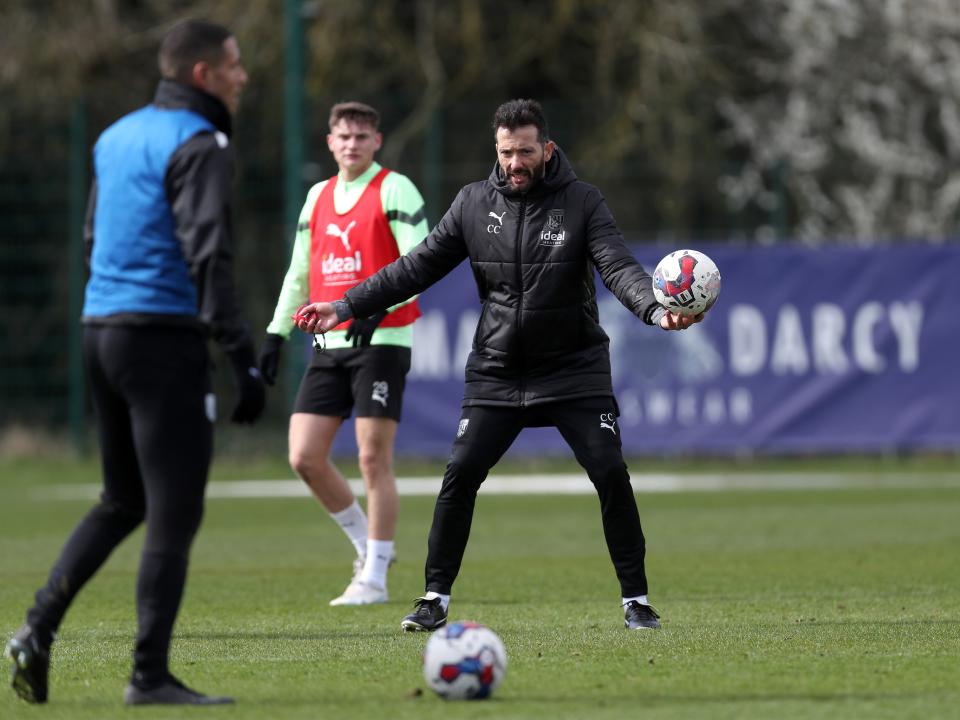 Carlos Corberán coaching the Albion squad on the training pitch