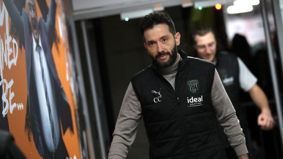 An image of Carlos Corberan arriving at Hull