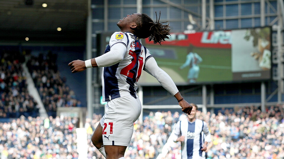 A photo of Brandon Thomas-Asante celebrating scoring for Albion v QPR