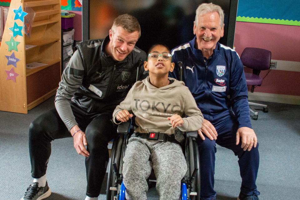 Brunt & Robertson with a pupil