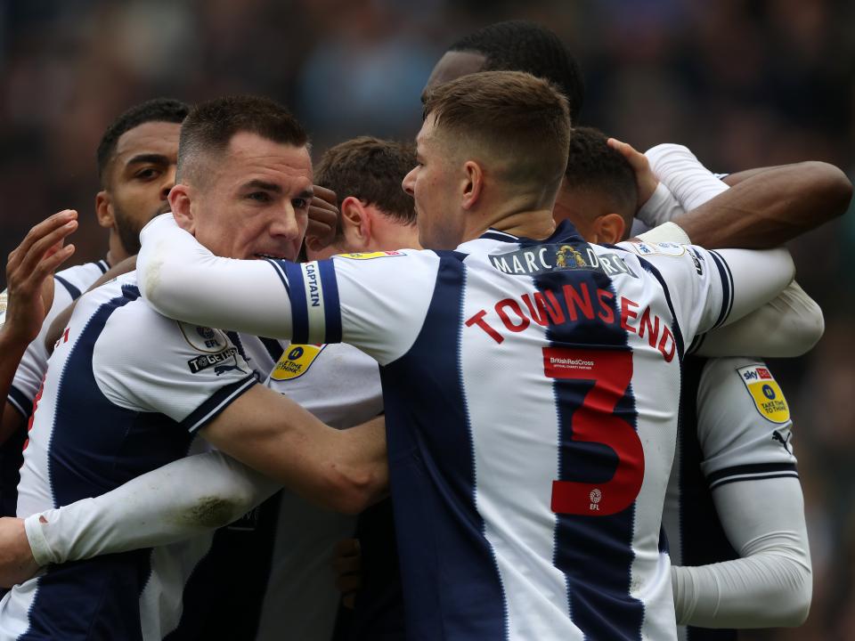 An image of Albion's players celebrating John Swift's goal against Sunderland
