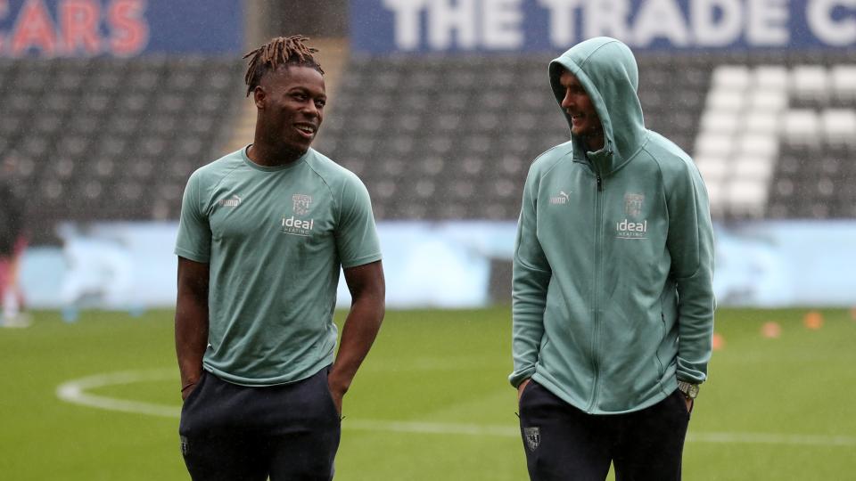 An image of Brandon Thomas-Asante and John Swift in Swansea