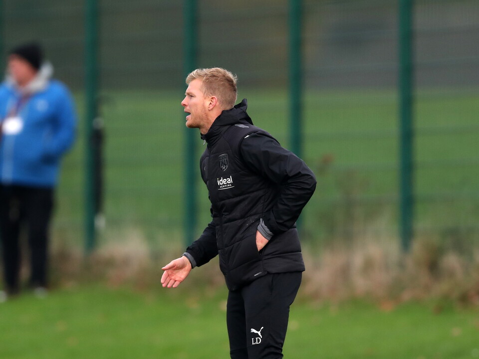 A photo of U18s manager Leigh Downing giving out instructions from the sidelines