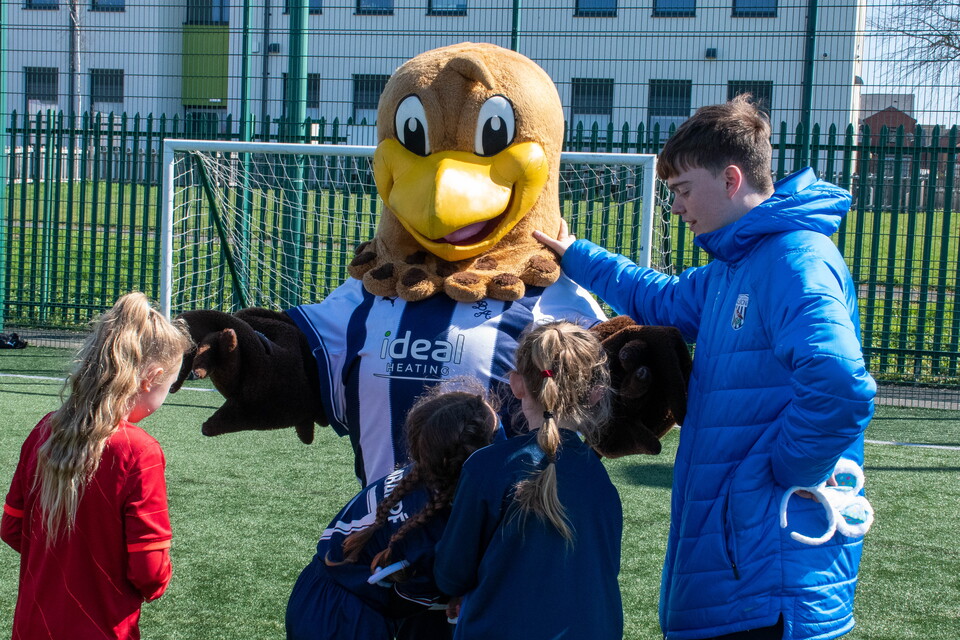 Foundation staff interacting with participants and Baggie Bird