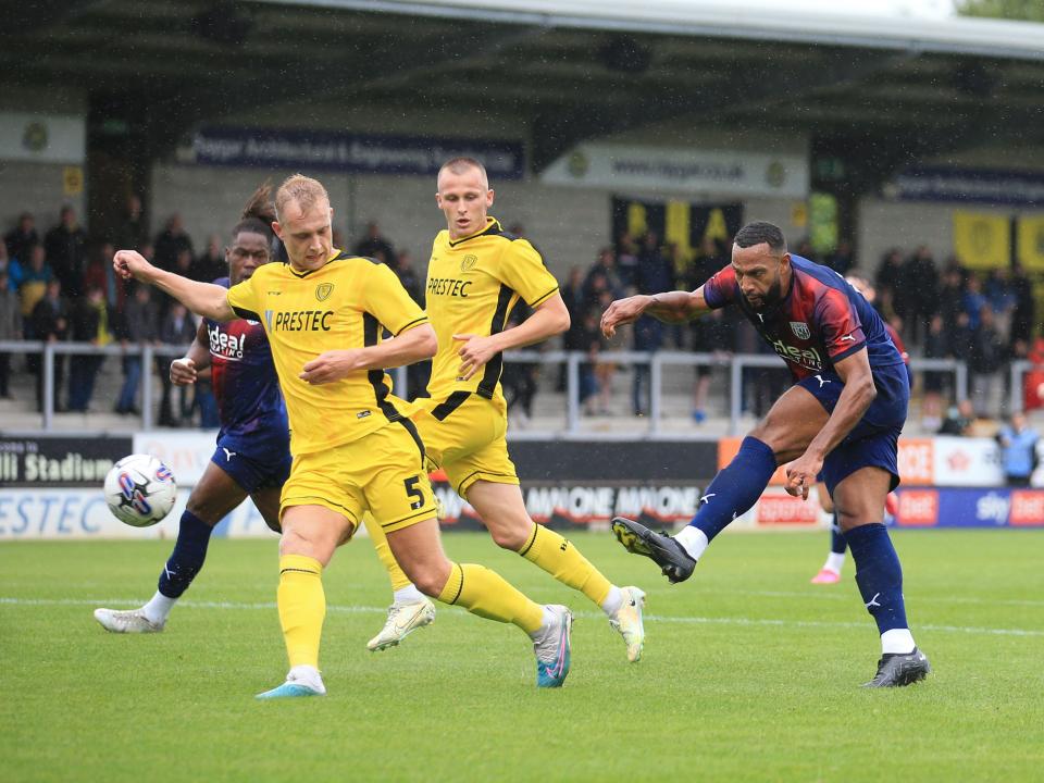 Matt Phillips shoots at goal against Burton