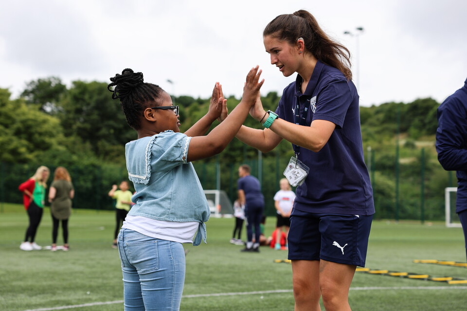 Foundation staff interacting with participant
