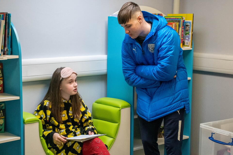 Foundation staff interacting with a participant