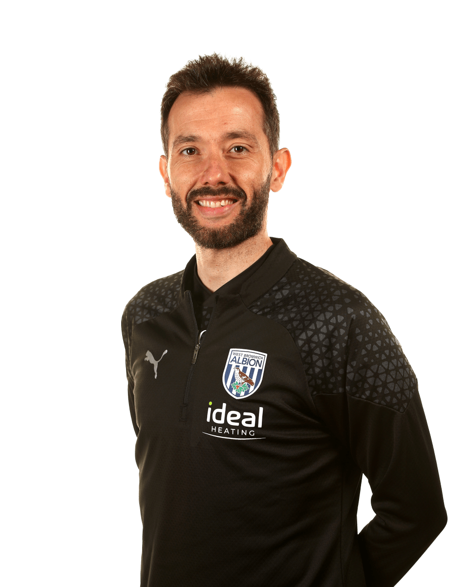 An official club photo headshot of Head Coach Carlos Corberán