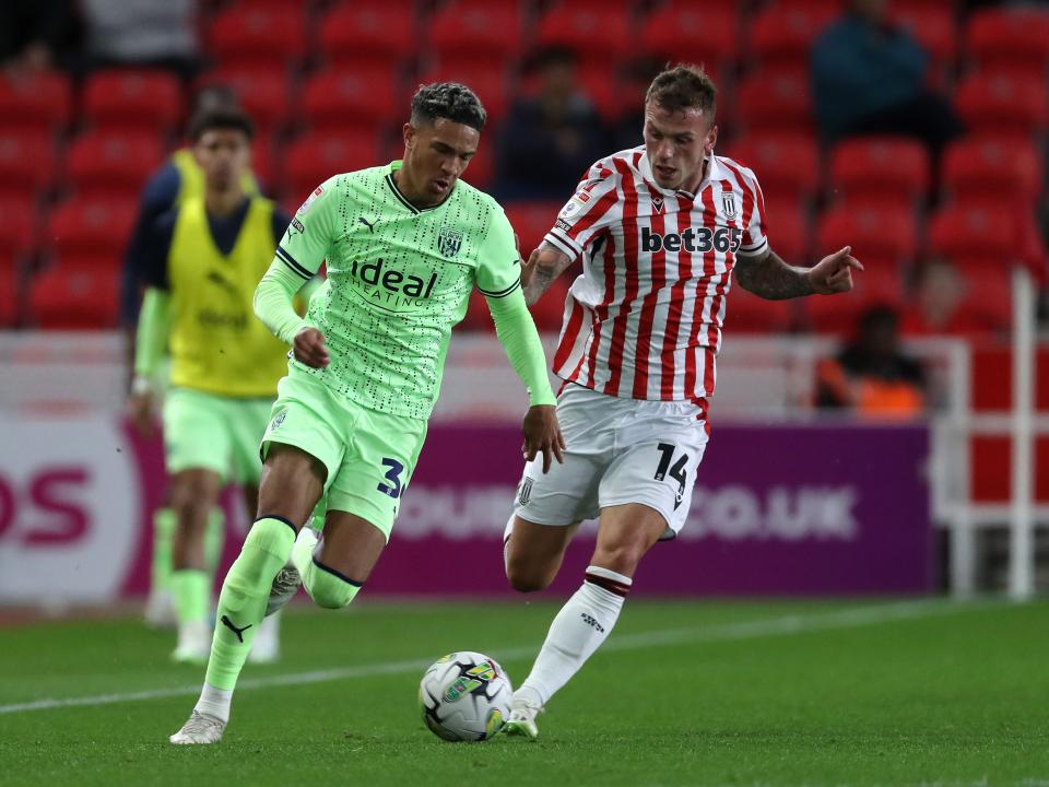 An image of Ethan Ingram on the ball against Stoke