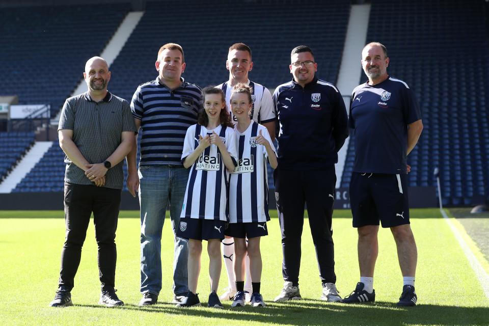 (left to right); Carl Burkitt, Simon Hill, Jed Wallace, Chris Winston, Paul Glover. (front row): Ashlee Glover, Isabel Glover.