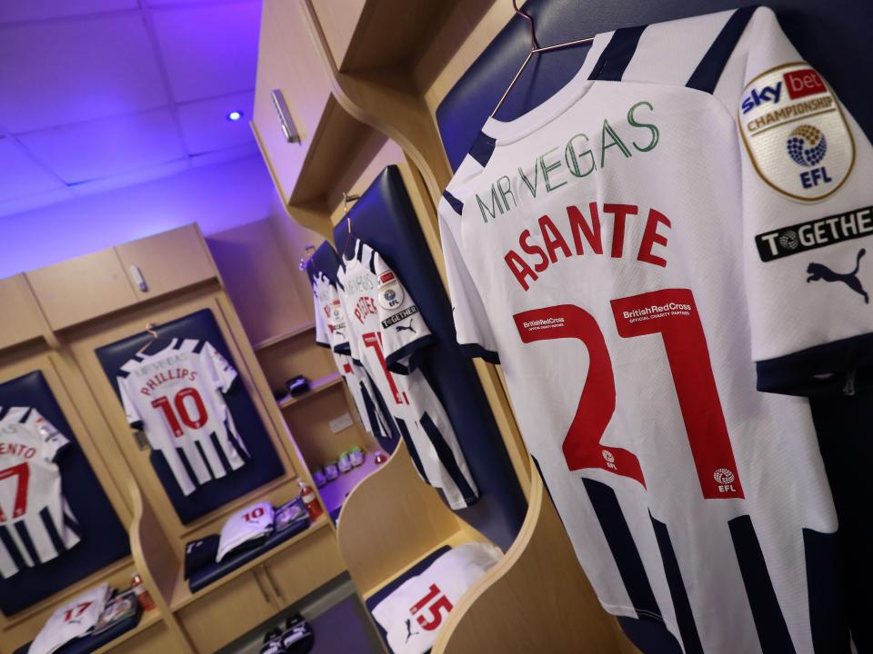 An image of Brandon Thomas-Asante's shirt hanging in the dressing room