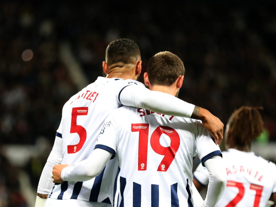 Kyle Bartley congratulates John Swift on his goal against Sheffield Wednesday