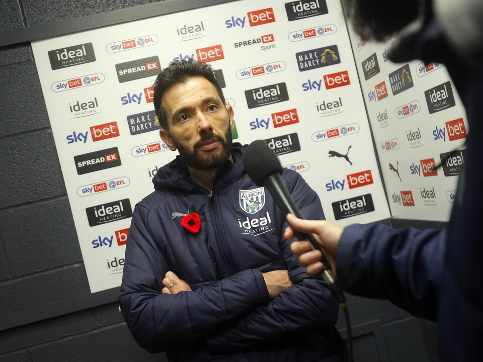 A photo of Carlos Corberán speaking to club TV following Albion's win over Hull