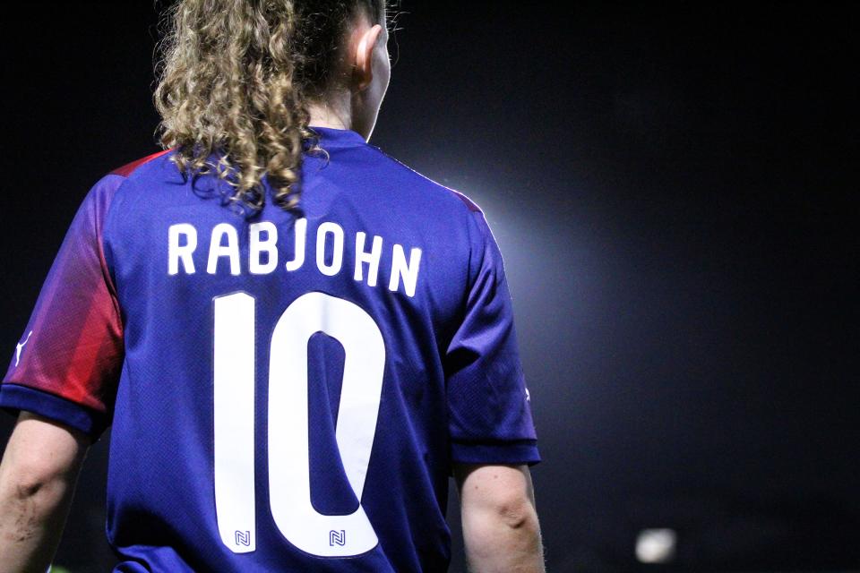 Liv Rabjohn, in red and blue away colours.