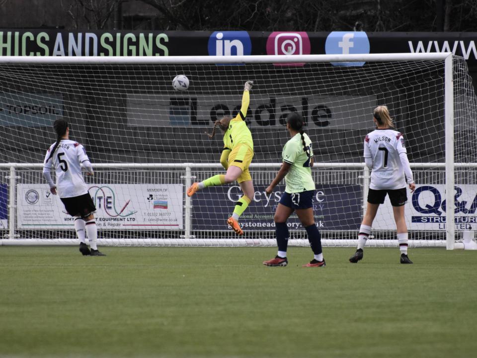 An image of Jhamat scoring against Derby Women