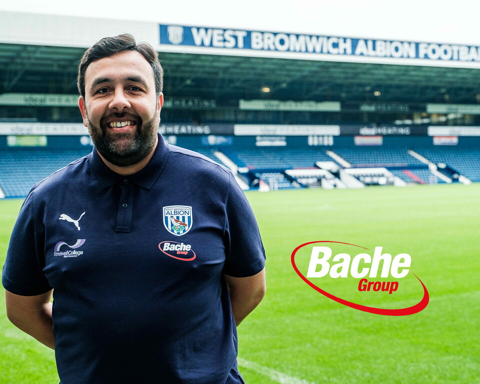 Shin Aquila standing pitchside