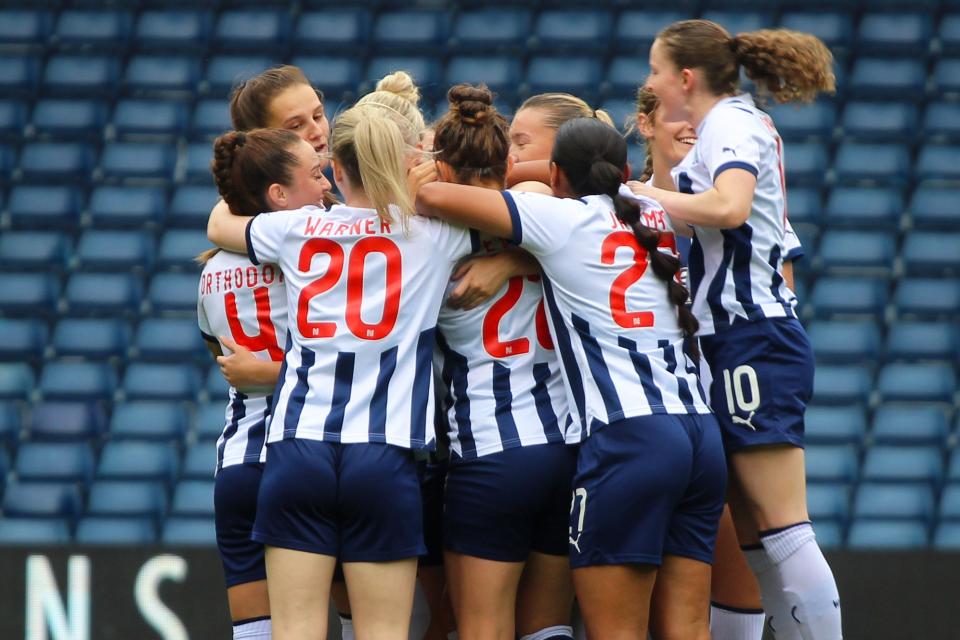 Albion Women celebrate, in home colours.