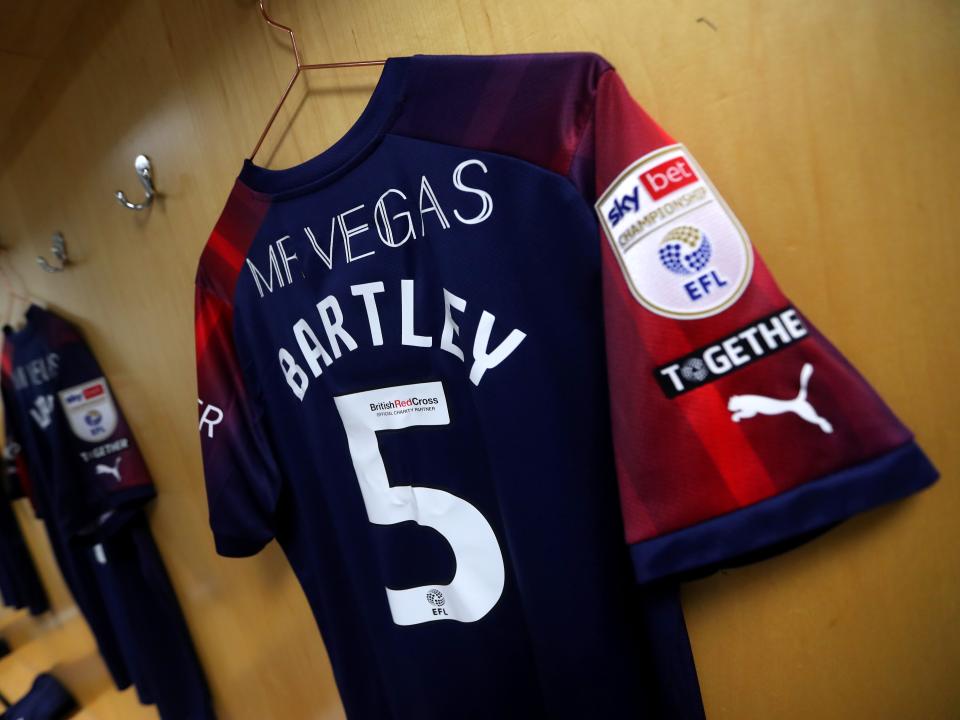 An image of Kyle Bartley's shirt hanging up in the dressing room at Swansea