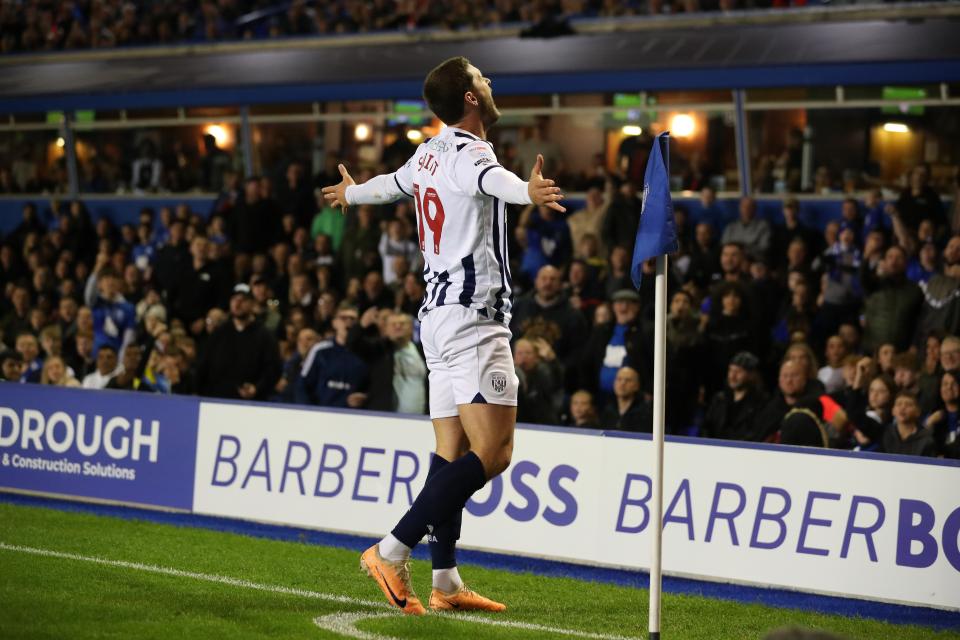 John Swift celebrates scoring against Birmingham City