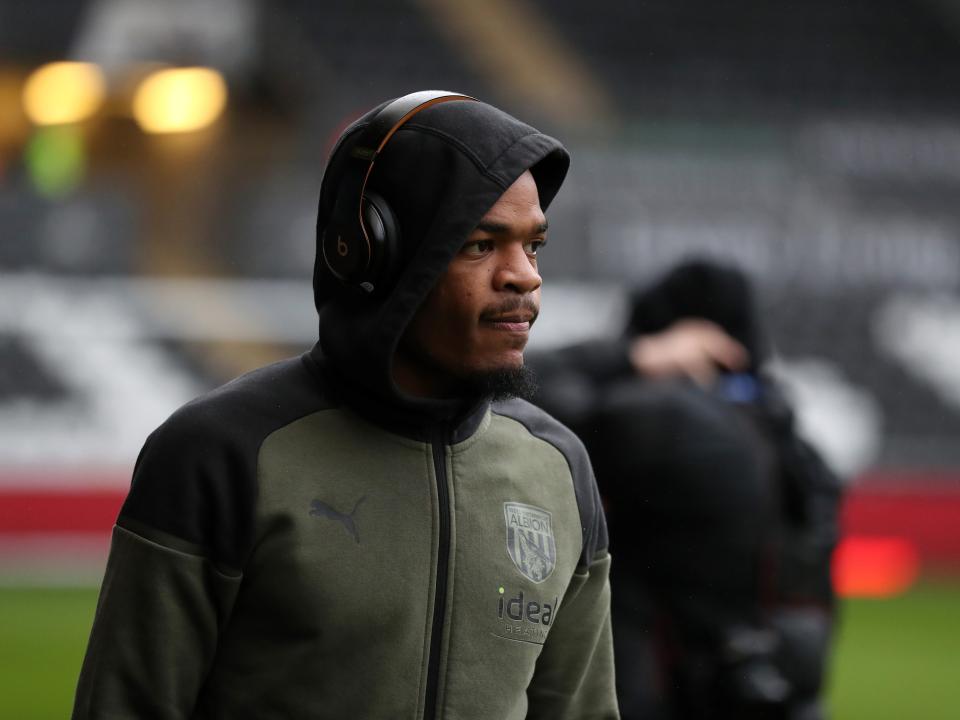 Grady Diangana in club tracksuit wearing headphones