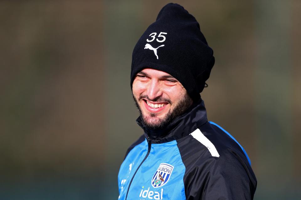 Okay Yokuslu smiling during a training session