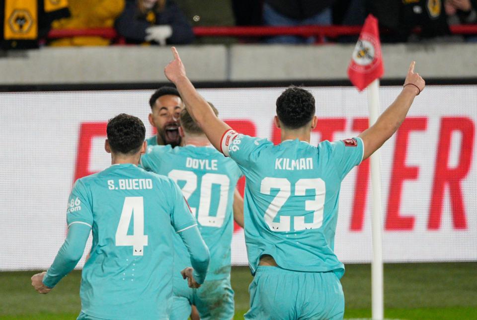 Wolves players celebrate scoring against Brentford in the third round of the Emirates FA Cup