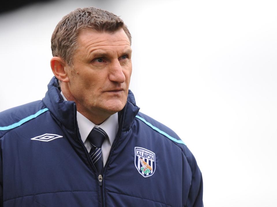 Tony Mowbray wearing a big Albion coat