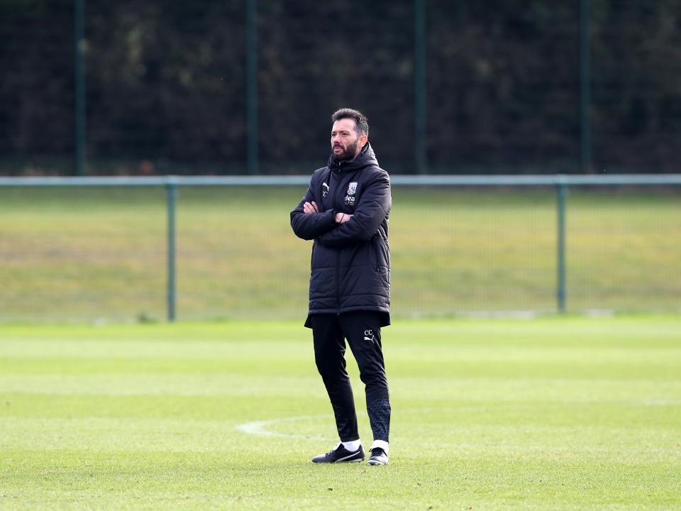 An image of Carlos Corberán leading training