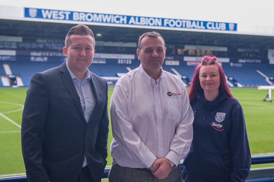 Chris Follows from International Tyres with Foundation staff Jon Ward & Jayne Norton at The Hawthorns