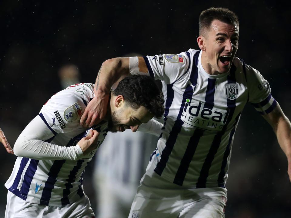 An image of Mikey Johnston and Jed Wallace celebrating a goal